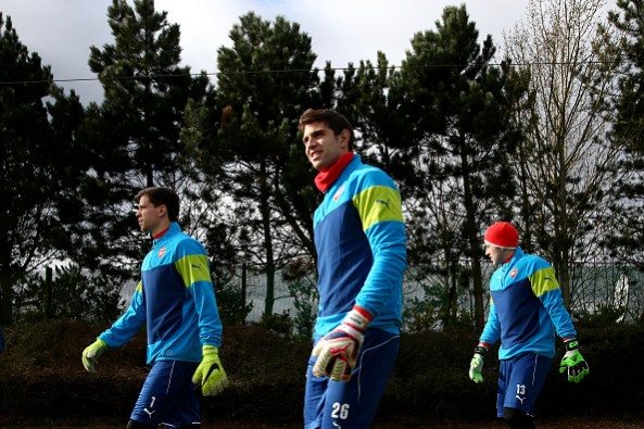 ST ALBANS, ENGLAND - FEBRUARY 24: (L-R) Arsenal goalkeepers Wojciech Szczesny, Damian Martínez and David Ospina arrive for the Arsenal training ses...