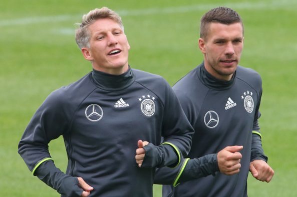germany lukas podolski bastian schweinsteiger e1471353007908