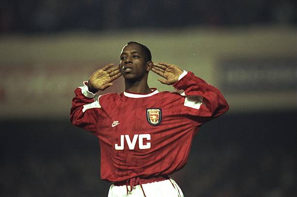 Top 10 Arsenal strikers under Arsene Wenger 8 11 Jan 1996: Ian Wright of Arsenal holds his hands to his ears during the Coca Cola Cup quarter-final against Newcastle at Highbury Stadium in London. Arsenal won the match 2-0. Mandatory Credit: Shaun Botterill/Allsport