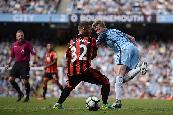 Loan watch: Wilshere restricted in midfield as Bournemouth beaten 2 Manchester City's Belgian midfielder Kevin De Bruyne (R) back-heals the ball past Bournemouth's English midfielder Jack Wilshere during the English Premier League football match between Manchester City and Bournemouth at the Etihad Stadium in Manchester, north west England, on September 17, 2016. (Photo credit should read OLI SCARFF/AFP/Getty Images)