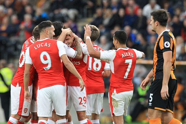 Five things Arsenal need if they are to catch Manchester City 2 Arsenal's Swiss midfielder Granit Xhaka (C) celebrates with teammates after scoring their fourth goal during the English Premier League football match between Hull City and Arsenal at the KCOM Stadium in Kingston upon Hull, north east England on September 17, 2016. / AFP / Lindsey PARNABY / RESTRICTED TO EDITORIAL USE. No use with unauthorized audio, video, data, fixture lists, club/league logos or 'live' services. Online in-match use limited to 75 images, no video emulation. No use in betting, games or single club/league/player publications. / (Photo credit should read LINDSEY PARNABY/AFP/Getty Images)