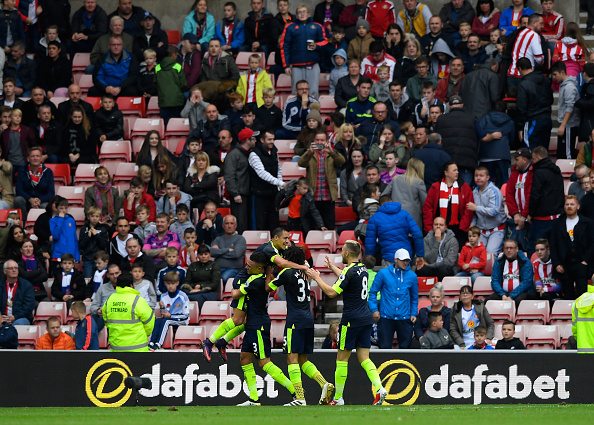 Gibbs shows his class 3 SUNDERLAND, ENGLAND - OCTOBER 29: Alexis Sanchez (1st L) of Arsenal celebrates scoring his team's fourth goal with his team-mates during the Premier League match between Sunderland and Arsenal at the Stadium of Light on October 29, 2016 in Sunderland, England.