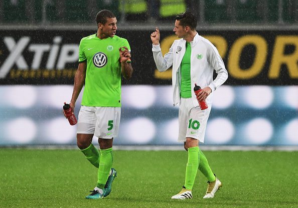 WOLFSBURG, GERMANY - OCTOBER 02: Jeffery Burma and Julian Draxler of Wolfsburg look dejected during the Bundesliga match between VfL Wolfsburg and 1. FSV Mainz 05 at Volkswagen Arena on October 2, 2016 in Wolfsburg, Germany. (Photo by Stuart Franklin/Bongarts/Getty Images)