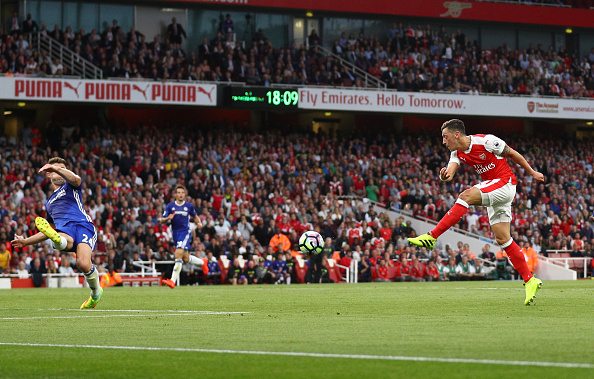 LONDON, ENGLAND - SEPTEMBER 24: Özil's importance to an ever-improving Arsenal side has been reiterated on a number of occasions, namely his performance against Chelsea in the final week of September which he marked with a half-volley. (Photo by Paul Gilham / Getty Images)