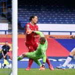 LIVERPOOL, ENGLAND - OCTOBER 17: Virgil van Dijk of Liverpool is tackled by Jordan Pickford of Everton which led to Virgil van Dijk being substituted for an injury during the Premier League match between Everton and Liverpool at Goodison Park on October 17, 2020 in Liverpool, England. Sporting stadiums around the UK remain under strict restrictions due to the Coronavirus Pandemic as Government social distancing laws prohibit fans inside venues resulting in games being played behind closed doors. (Photo by Laurence Griffiths/Getty Images)