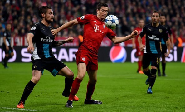 Mathieu Debuchy and Robert Lewandowski