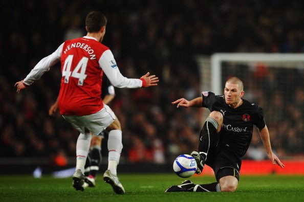 LONDON, UNITED KINGDOM - MARCH 02: Ben Chorley (R) of Leyton Orient tackles Conor Henderson (L) of Arsenal during the FA Cup sponsored by E.ON 5th ...