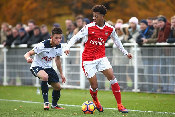 ENFIELD, ENGLAND - NOVEMBER 18: Anthony Georgiou of Tottenham Hotspur and Chris Willock of Arsenal in action during the Premier League 2 match betw...