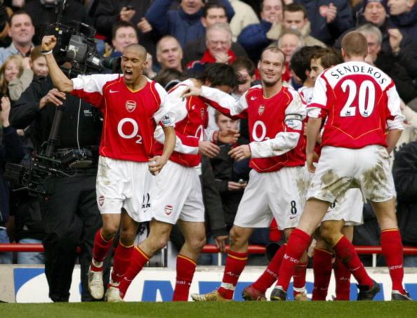 Freddie Ljungberg’s journey from Calvin Klein to Arsenal’s Invincibles: 26 years on 6 LONDON, UNITED KINGDOM: Arsenal's Fredrik Ljungberg (C) celebrates with his team mates after Robert Pires scored a goal, during their Premiership, F.A cup against Sheffield United at Arsenals Highbury grounds, 19 February 2005. The match ended in a 1-1 draw. AFP PHOTO/CARL DE SOUZA No telcos, website uses subject to subscription of a license with FAPL on www.faplweb.com (Photo credit should read CARL DE SOUZA/AFP/Getty Images)