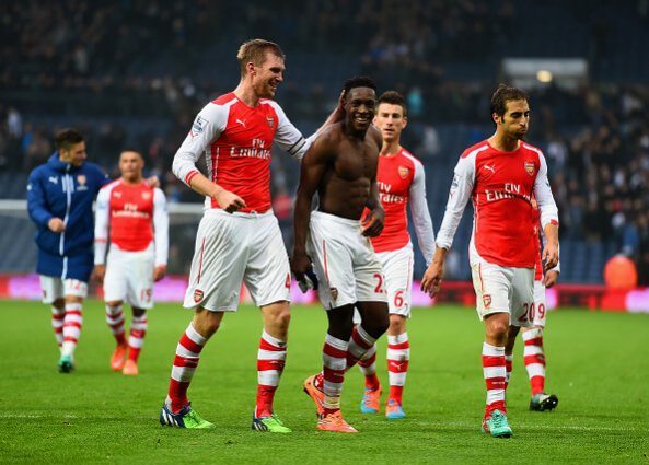 WEST BROMWICH, ENGLAND - NOVEMBER 29: Per Mertesacker of Arsenal shares a joke with Danny Welbeck of Arsenal after the Barclays Premier League matc...
