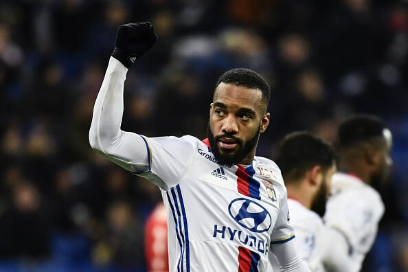 Lacazette (C) celebrates his strike against Nancy last Wednesday