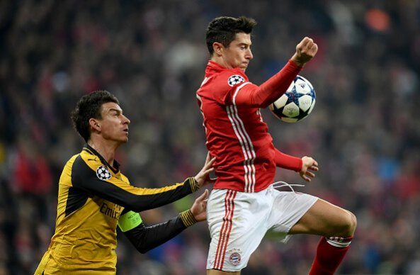 Laurent Koscielny and Robert Lewandowski