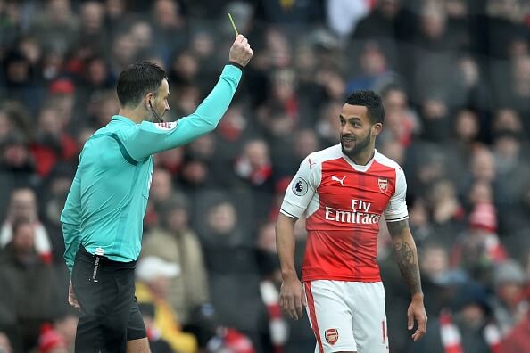 Mark Clattenburg books Theo Walcott