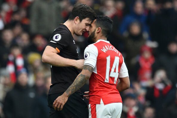 Harry Maguire and Theo Walcott