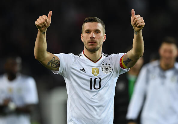 DORTMUND, GERMANY - MARCH 22: Lukas Podolski of Germany shows appreciation to the fans after his last international match for Germany after the int...