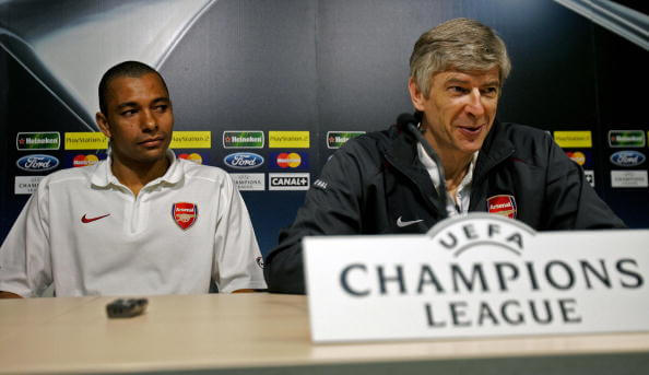 Valencia, SPAIN: Arsenal's Gilberto (L) and manager Arsene Wenger are seen at a press conference at the Madrigal stadium in Villarreal ahead of the...