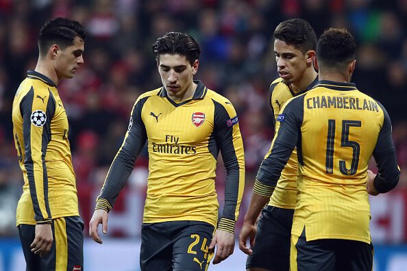MUNICH, GERMANY - FEBRUARY 15: Granit Xhaka, Hector Bellerin, Gabriel Paulista and Alex Oxlade-Chamberlain (L-R) of Arsenal react during the UEFA C...
