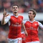 LONDON, ENGLAND - MAY 07: Granit Xhaka of Arsenal celebrates scoring his sides first goal with Nacho Monreal of Arsenal during the Premier League match between Arsenal and Manchester United at the Emirates Stadium on May 7, 2017 in London, England. (Photo by Richard Heathcote/Getty Images)