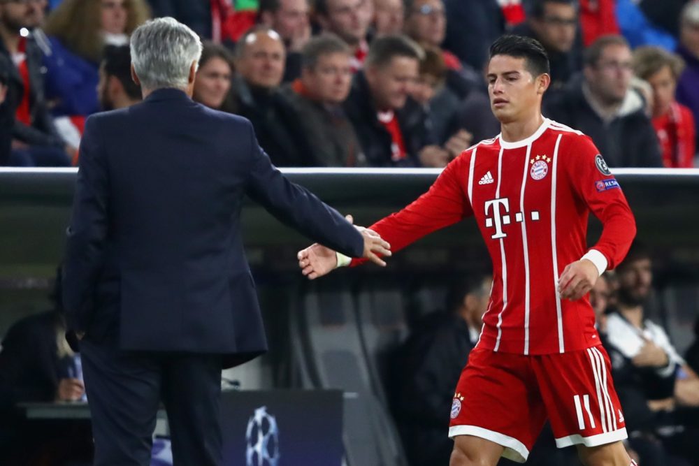 James Rodriguez must really like Carlo Ancelotti 2 MUNICH, GERMANY - SEPTEMBER 12: James Rodriguez of Bayern Muenchen shake hands with his head coach Carlo Ancelotti during the UEFA Champions League group B match between FC Bayern Muenchen and RSC Anderlecht at Allianz Arena on September 12, 2017 in Munich, Germany. (Photo by Alexander Hassenstein/Bongarts/Getty Images)