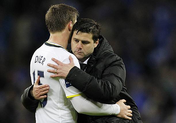 Eric Dier and Mauricio Pochettino consoling League Cup final