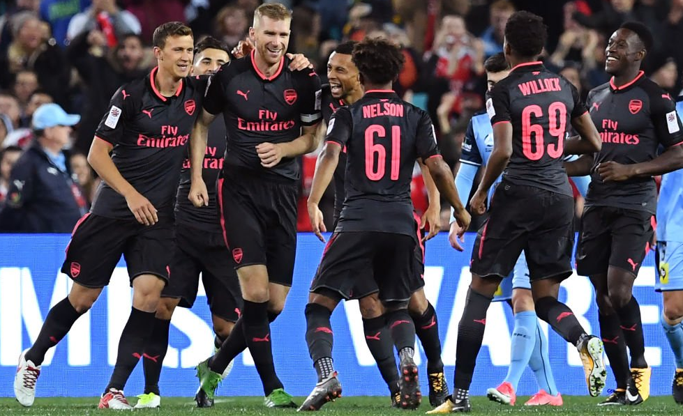 Mertesacker celebrates his opening goal
