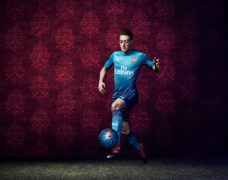 Ozil in the new blue Arsenal kit