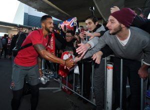 Theo Walcott greets fan