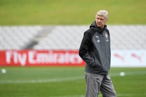 Wenger looks on
