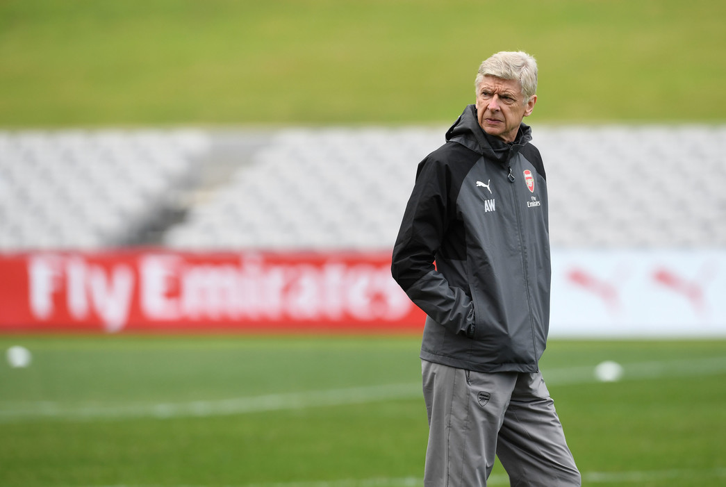 Wenger looks on