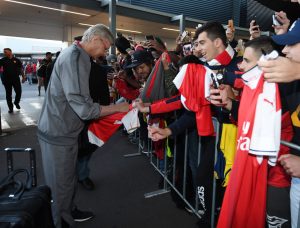 Wenger signs shirt