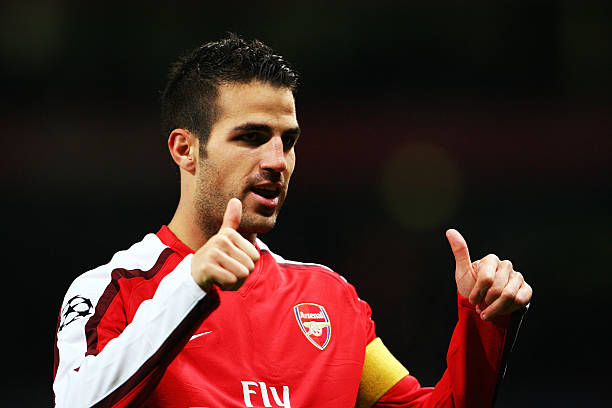 LONDON, ENGLAND - NOVEMBER 04: Cesc Fabregas of Arsenal celebrates scoring his second and the teams the third goal of the game during the UEFA Cham...