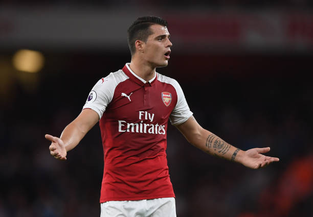 LONDON, ENGLAND - AUGUST 11: Granit Xhaka of Arsenal gestures to his team mates during the Premier League match between Arsenal and Leicester City ...