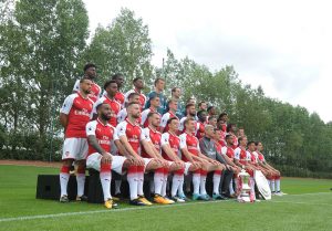 ST ALBANS, ENGLAND - SEPTEMBER 12: Arsenal 1st team squad season 2017/18. Back row (L-R): Ainsley Maitland-Niles, Eddie Nketiah, Jeff Reine-Adelaide, Matt Macey, Petr Cech, David Ospina, Calum Chambers, Chuba Akpom, Reiss Nelson. Middle Row (L-R): Francis Coquelin, Joe Willock, Mathieu Debuchy, Granit Xhaka, Rob Holding, Olivier Giroud, Danny Welbeck, Sead Kolasinac, Alex Iwobi, Mohamed Elneny, Jack Wilshere. Front row (L-R): Alexandre Lacazette, Shkodran Mustafi, Aaron Ramsey, Mesut Ozil, Per Mertesacker, Arsenal Wenger (Manager), Laurent Koscielny, Theo Walcott, Nacho Monreal, Alexis Sanchez, Hector Bellerin.at London Colney on September 12, 2017 in St Albans, England. (Photo by Stuart MacFarlane/Arsenal FC via Getty Images)