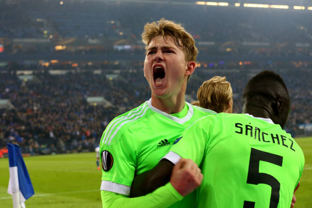 GELSENKIRCHEN, GERMANY - APRIL 20: (L-R) Matthijs de Ligt and Davinson Sanchez of Amsterdam celebrate the second goal with Davy Klaassen of Amsterd...