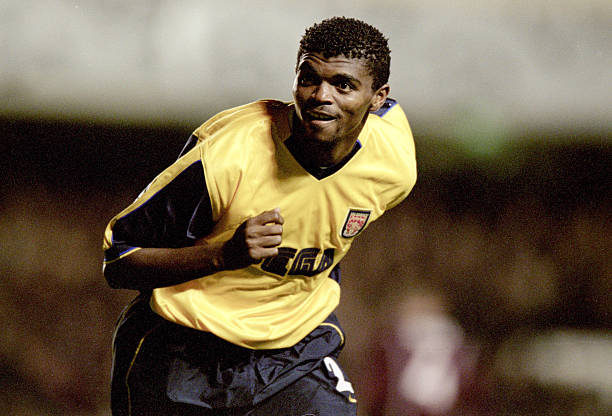 25 Oct 2000: Nwankwo Kanu of Arsenal celebrates during the UEFA Champions League match against Sparta Prague at Highbury in London. Arsenal won the match 4-2. Credit: Jamie McDonald /Allsport