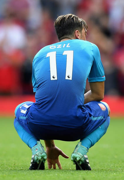 LIVERPOOL, ENGLAND - AUGUST 27: Mesut Ozil of Arsenal is dejected after the Premier League match between Liverpool and Arsenal at Anfield on August 27, 2017 in Liverpool, England. (Photo by Michael Regan/Getty Images)