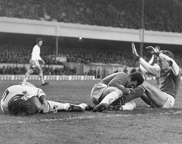 Unsung Arsenal heroes: Sammy Nelson 5 10th January 1976: Players on the ground after a goalmouth collision during a match between Arsenal and Aston Villa at Highbury. Chris Nicholl of Aston Villa is on the left, beside goalkeeper John Burridge and Sammy Nelson of Arsenal. (Photo by Dennis Oulds/Central Press/Getty Images)