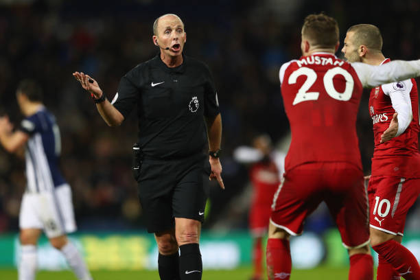 Wenger charged by the FA 2 Mike Dean