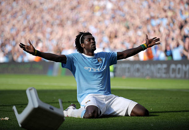 MANCHESTER, ENGLAND - SEPTEMBER 12: Emmanuel Adebayor of Manchester City celebrates in front of the Arsenal fans after scoring during the Barclays Premier League match between Manchester City and Arsenal at the City of Manchester Stadium on September 12, 2009 in Manchester, England. (Photo by Shaun Botterill/Getty Images)