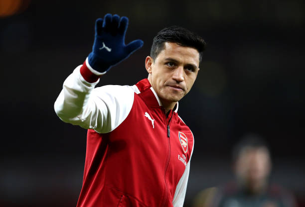 LONDON, ENGLAND - JANUARY 03: Alexis Sanchez of Arsenal warms up prior to the Premier League match between Arsenal and Chelsea at Emirates Stadium ...