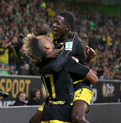 WOLFSBURG, GERMANY - SEPTEMBER 20: Pierre-Emerick Aubameyang (L) of Dortmund celebrates after scoring his team's second goal with Ousmane Dembele (...