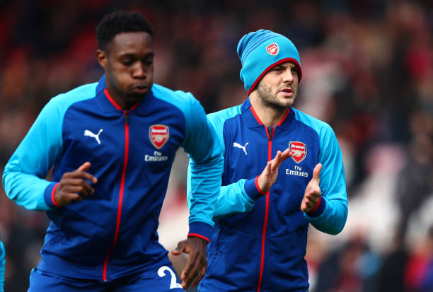 BOURNEMOUTH, ENGLAND - JANUARY 14: Mathieu Debuchy of Arsenal and Jack Wilshere of Arsenal warms up prior to the Premier League match between AFC B...