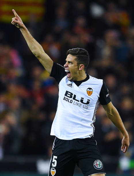 VALENCIA, SPAIN - NOVEMBER 26: Gabriel Paulista of Valencia CF celebrates after his team mate Rodrigo Moreno scored his team's first goal during th...