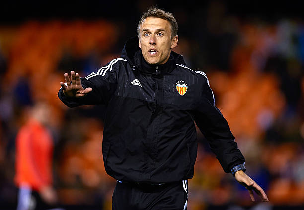 VALENCIA, SPAIN - MARCH 06: Valencia CF assistant coach Phil Neville gives instructions prior to the La Liga match between Valencia CF and Atletico...