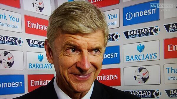 Wenger's face during a post-match interview before Arsenal signed Mesut Ozil in 2013
