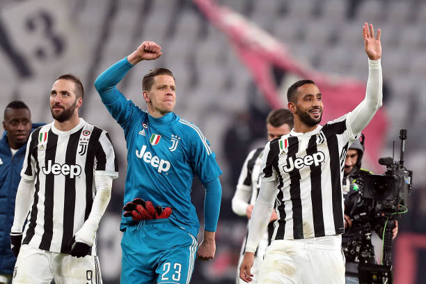 TURIN, ITALY - DECEMBER 23: Medhi Benatia and Wojciech Szczesny of Juventus reacts during the serie A match between Juventus and AS Roma at the All...