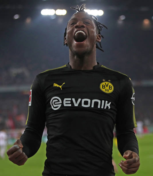 COLOGNE, GERMANY - FEBRUARY 02: Michy Batshuayi of Dortmund celebrates scoring his second goal on his debut during the Bundesliga match between 1. ...