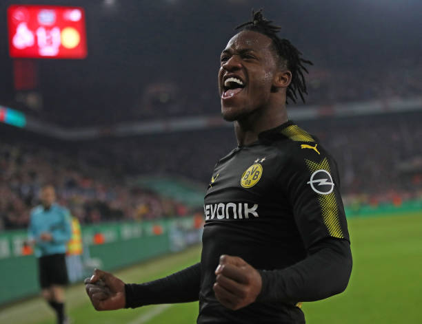COLOGNE, GERMANY - FEBRUARY 02: Michy Batshuayi of Dortmund celebrates scoring his second goal on his debut during the Bundesliga match between 1. ...