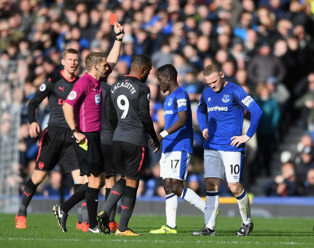 LIVERPOOL, ENGLAND - OCTOBER 22: Idrissa Gueye of Everton is is shown his second yellow card of the game by referee Craig Pawson during the Premier...