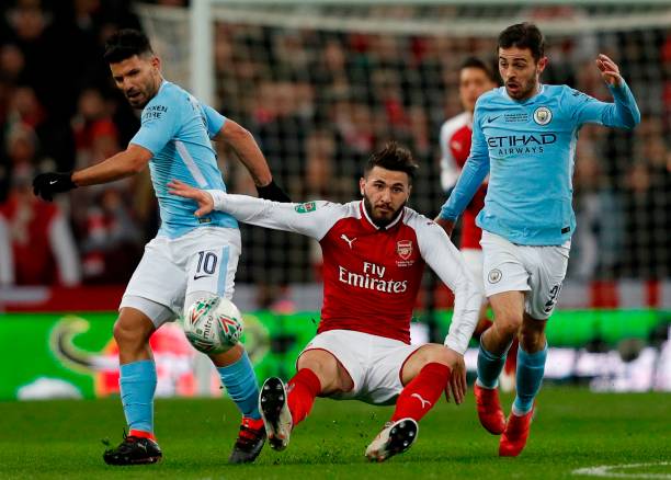 Picking out the worst performers: Arsenal ratings v Manchester City 5 Arsenal's German-born Bosnian defender Sead Kolasinac (C) vies with Manchester City's Argentinian striker Sergio Aguero and Manchester City's Portuguese midfielder Bernardo Silva (R) during the English League Cup final football match between Manchester City and Arsenal at Wembley stadium in north London on February 25, 2018. / AFP PHOTO / Adrian DENNIS /